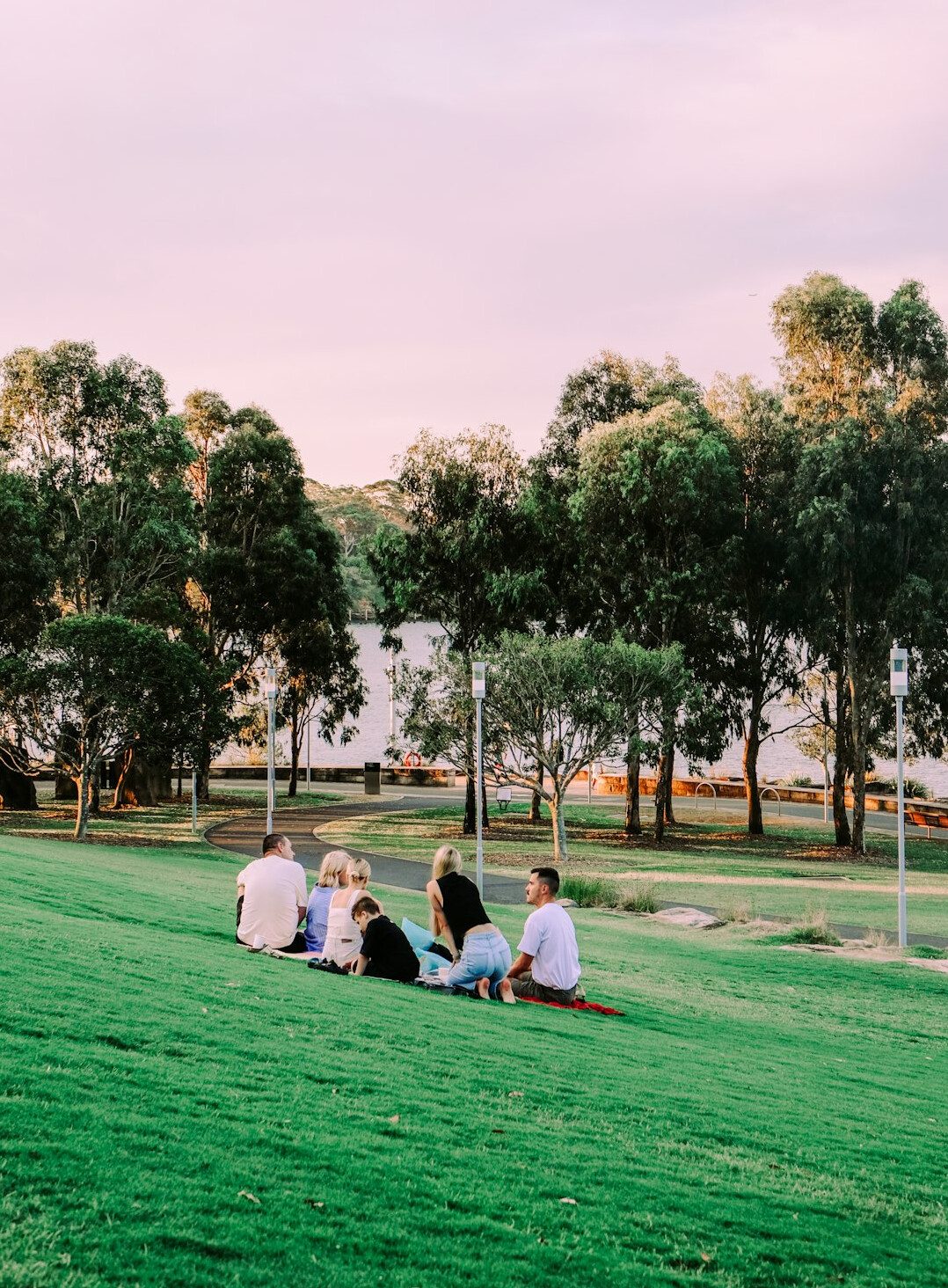 Small group of people sitting in a circle talking and listening