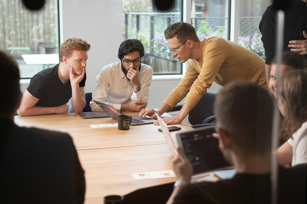 woman leading team meeting